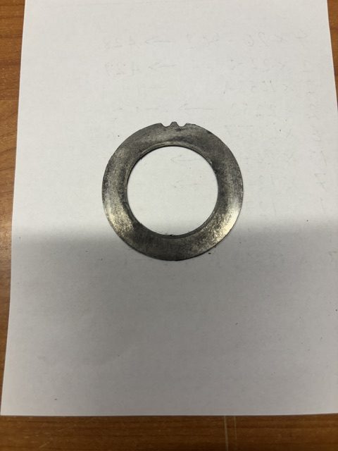 Steering column thrust washer.