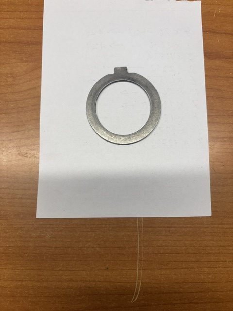 Steering column tanged washer