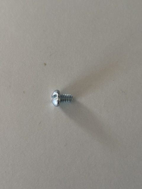 Headlight Bulb retaining ring screw.